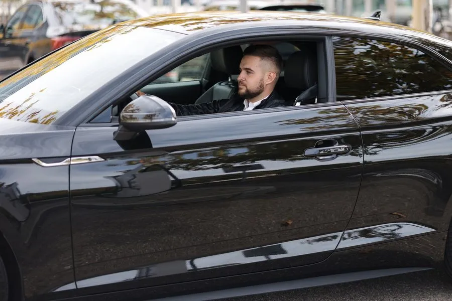 Driver en route during London airport transfer service